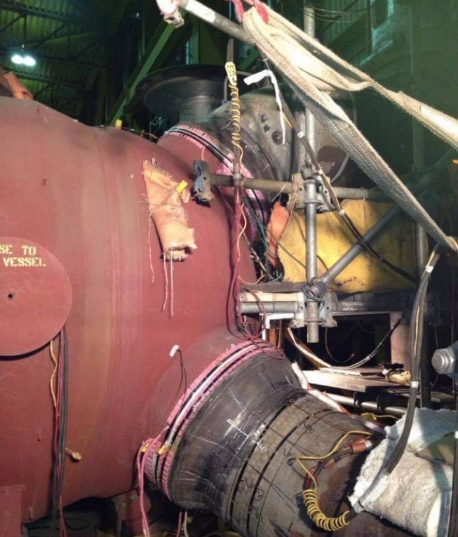 Vessel nozzle weld with heat treatment